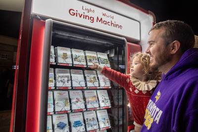 Light The World Giving Machine Logo